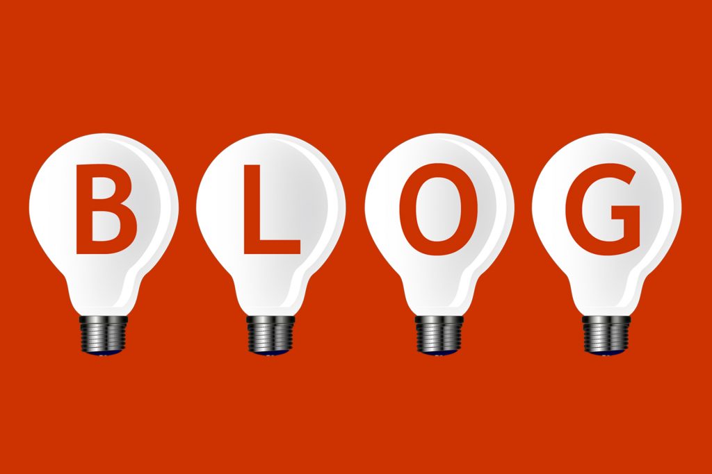 BLOG-written-in-four-white-lightbulbs-on-red-background