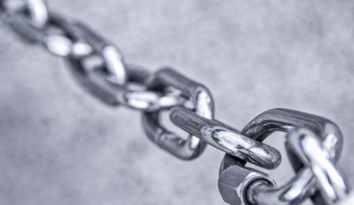 Stainless-steel-chain-on-grey-background