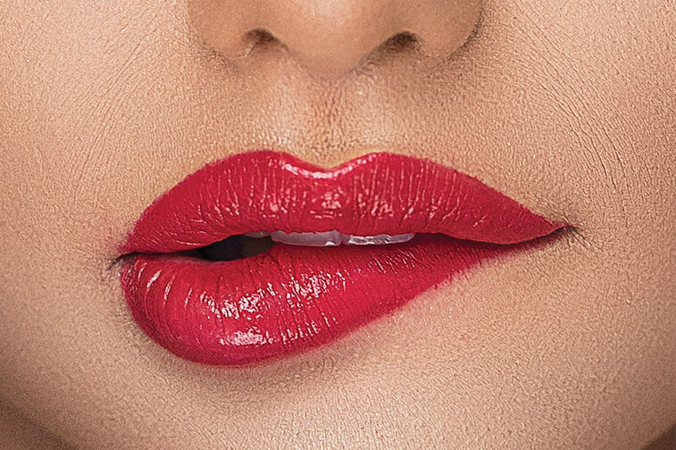 Woman’s-mouth-with-red-lips-biting-lip