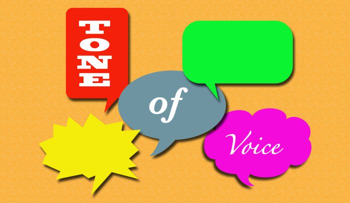 Speech bubbles in different colours and shapes containing the words 'Tone of Voice'