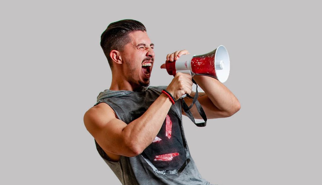 Man-shouting-through-a-megaphone