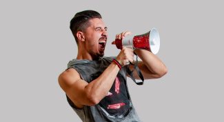 Man-shouting-through-a-megaphone