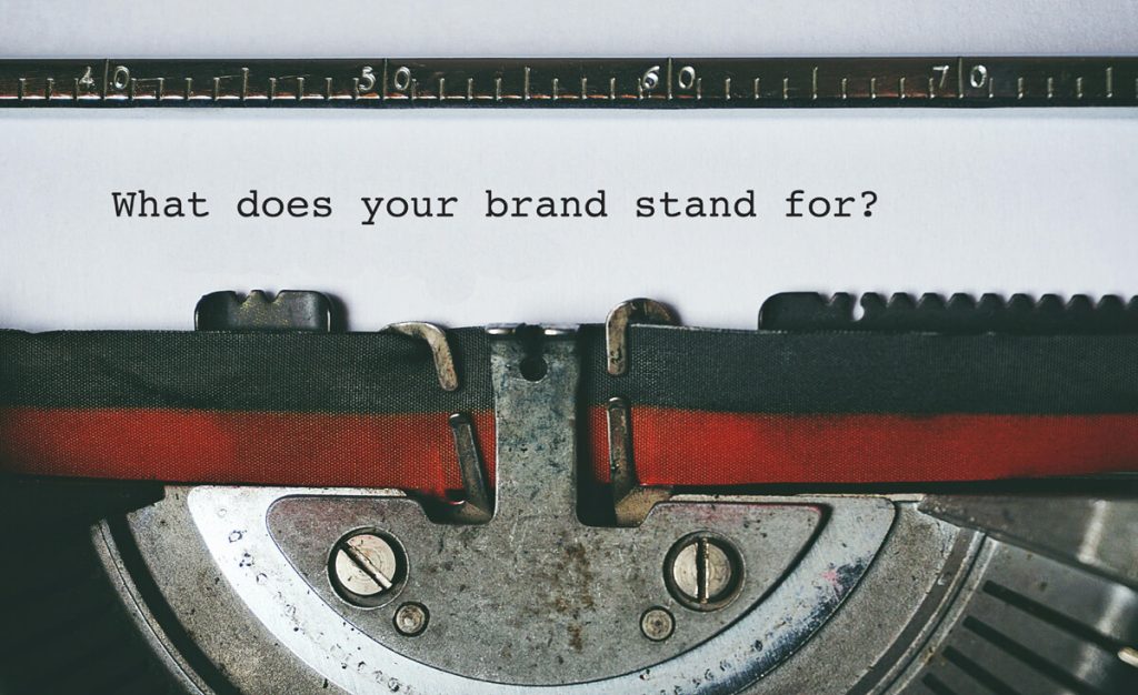 Close-up-of-typewriter-head-which-has-just-typed-What-does-your-brand-stand-for?