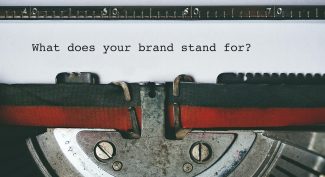 Close-up-of-typewriter-head-which-has-just-typed-What-does-your-brand-stand-for?