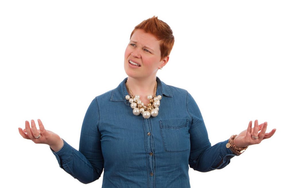 Woman-in-denim-shirt-shrugging